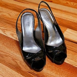Black high heel sandals with platform under the sole.  size 8.5.